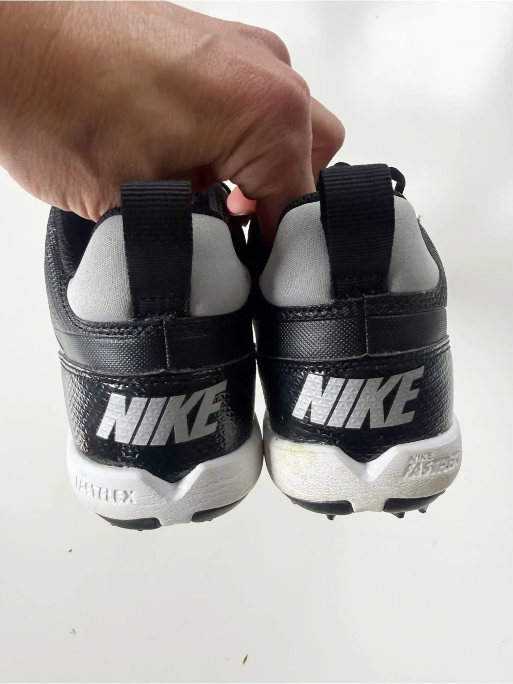 Nike Kids Black and Silver Cleats